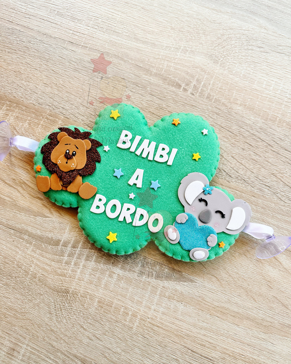 Bimbi a bordo in pannolenci a forma di stella con koala